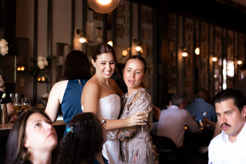 candid photos of guest at restaurant wedding reception in brooklyn ny, taken by stef reyes photo. 