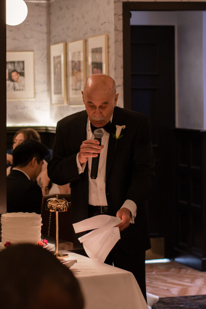 photo of dad making a speech for small wedding at delmonicos taken by stef reyes photo. 