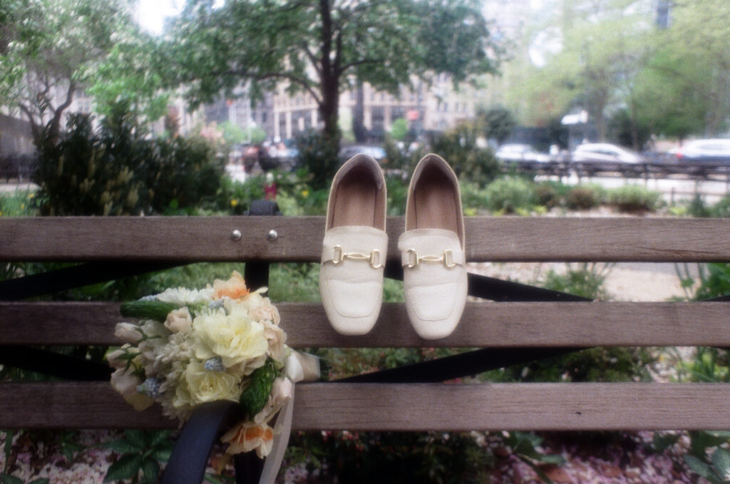 photo of shoes and bouquet details post new york city hall wedding, stef reyes photo