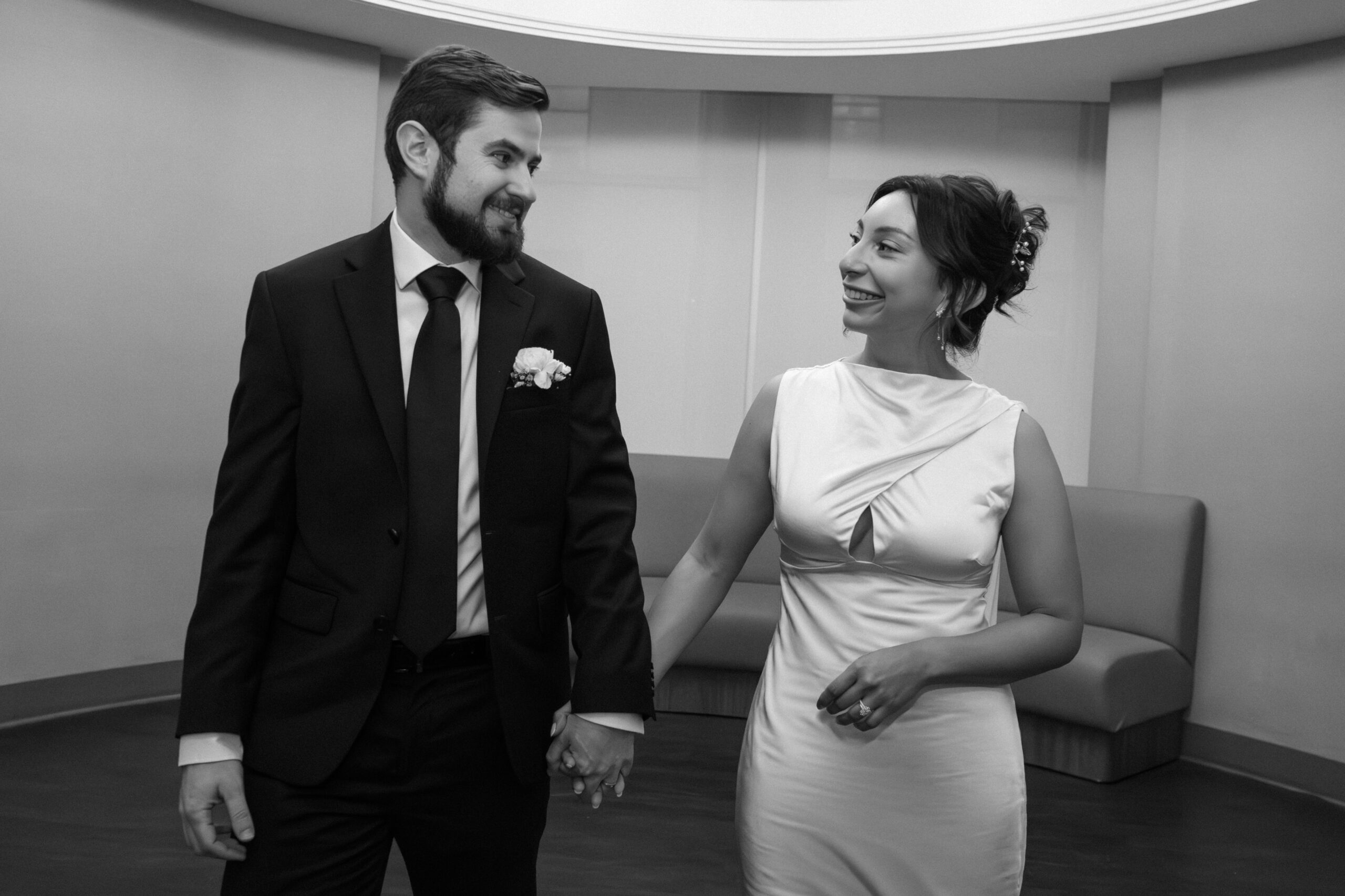 wedding portrait exiting their manhattan city hall ceremony