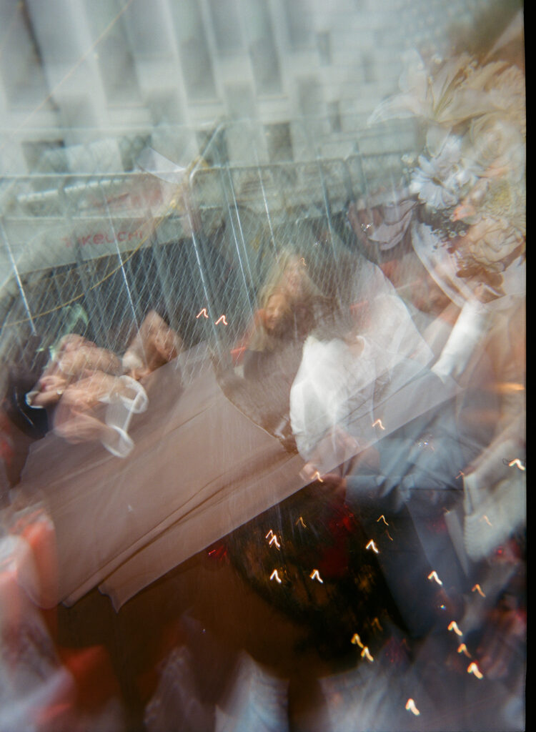 film blurry photo of manhattan city hall elopement exit, stef reyes photo. 