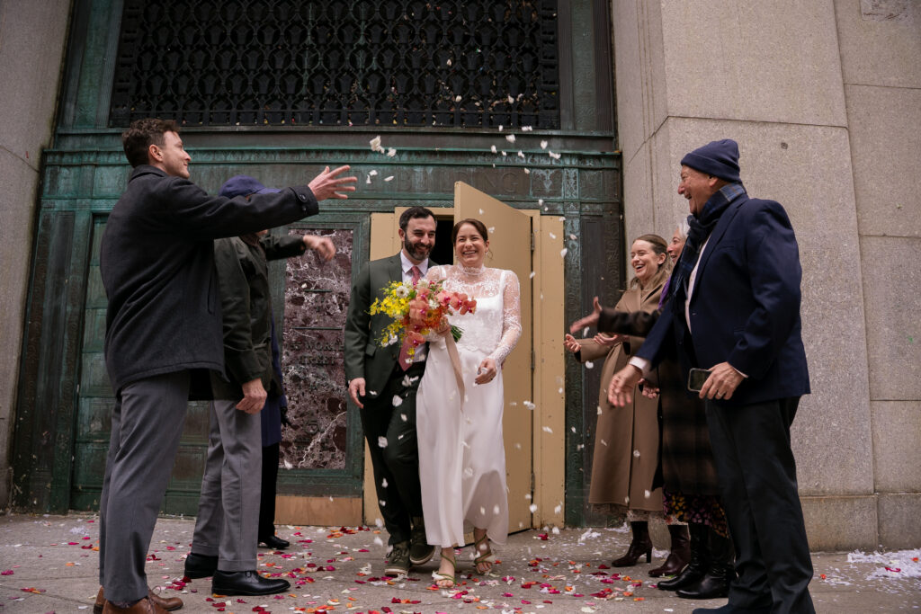 Couple exiting and celebrating their court house wedding ceremony, stef reyes photo