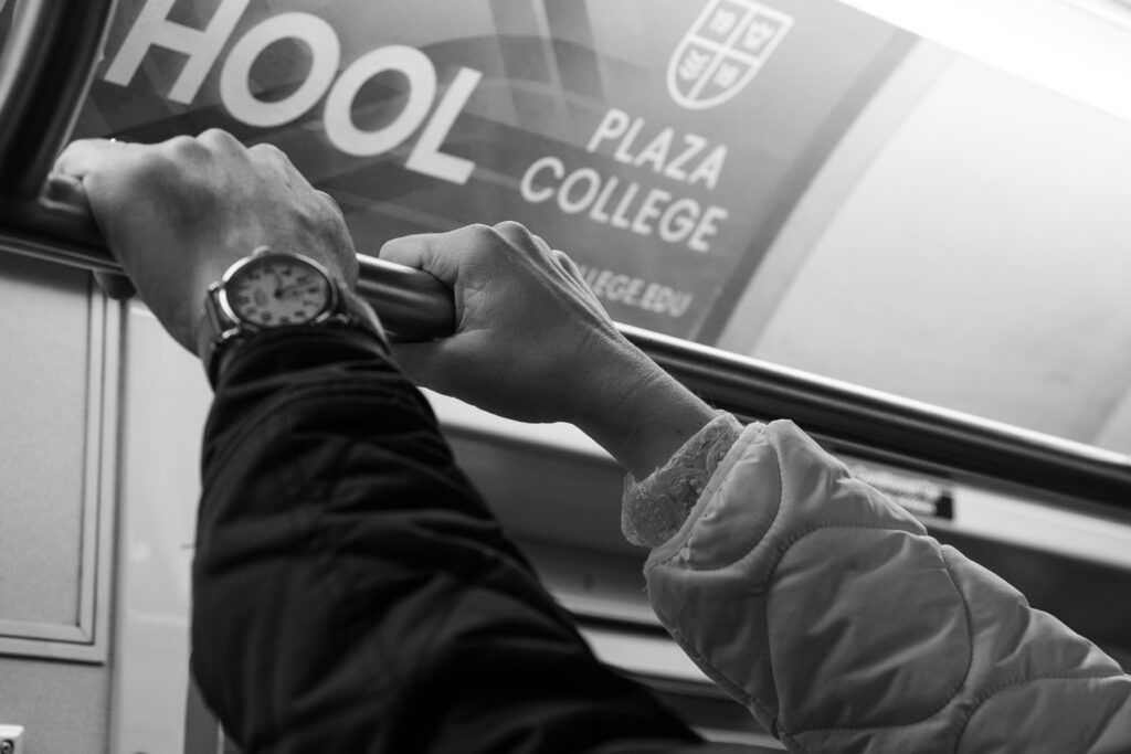 couple takes the subway after their city hall ceremony, stef reyes photo