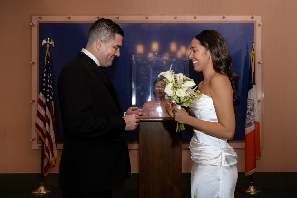 couple gives each other rings during their manhattan courthouse ceremony, stef reyes photo